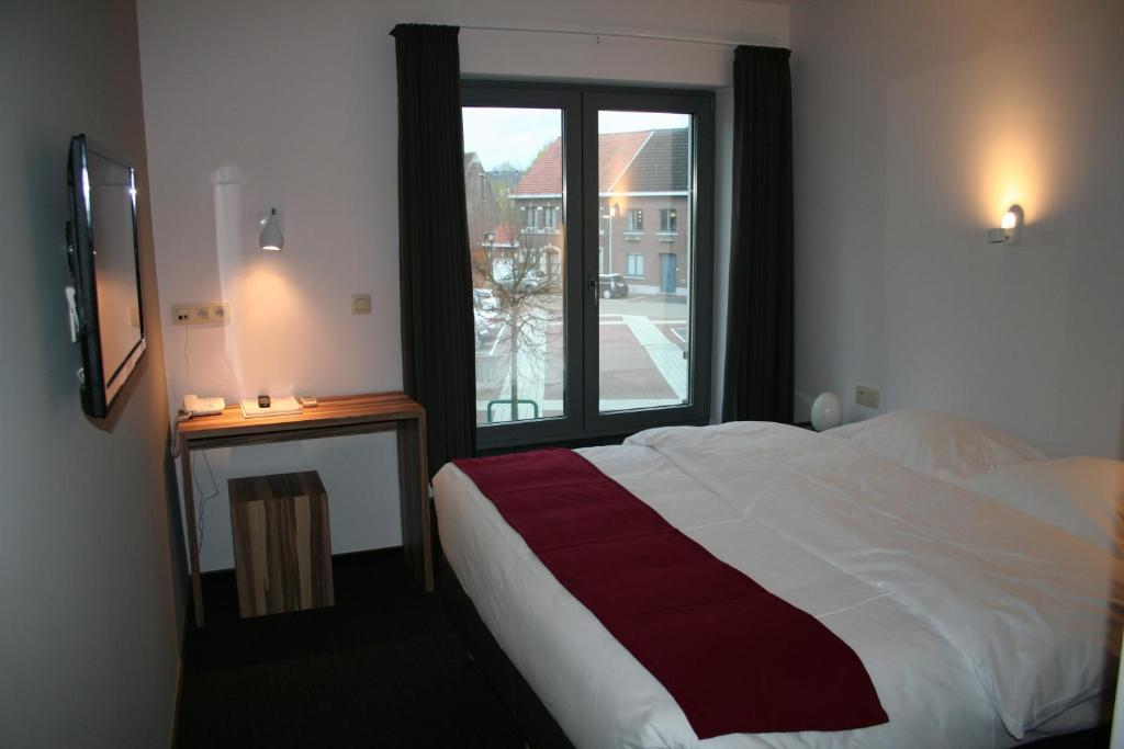 Hotel Carpinus Herent Quarto foto